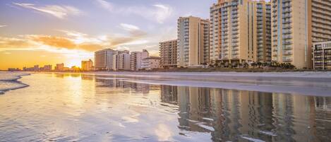 On the beach, sun-loungers, beach towels