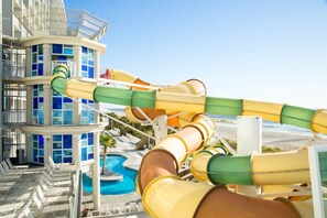 A water park with multiple slides and a pool area. - Ocean Escape Condos (Myrtle Beach)