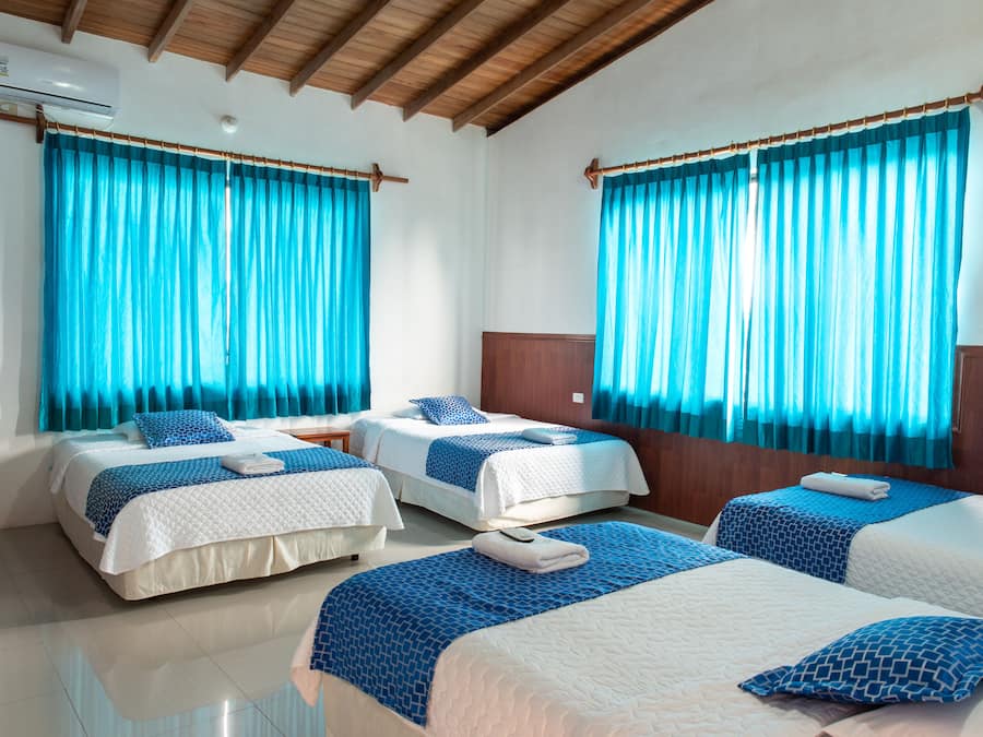 Quadruple Room | Desk, blackout curtains, iron/ironing board, free WiFi