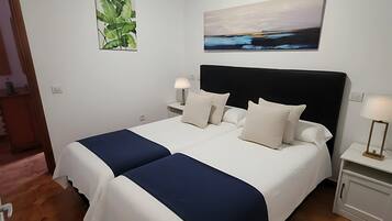 Deluxe Apartment, 1 Bedroom | 1 bedroom, in-room safe, individually decorated, individually furnished