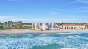 On the beach, sun-loungers, beach towels