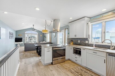 Renovated with Backyard Oasis! Quick Walk to Town & Beach. 4 BRs. Sleeps 10