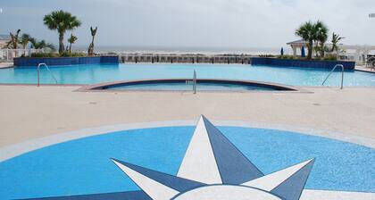 Beautiful beach view condo. Walk to the beach or the Pointe West Beach Club.