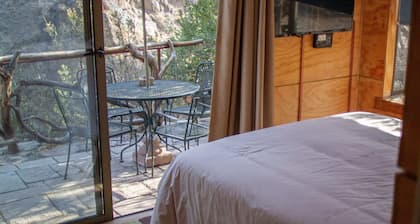 Ñilhue house with forest and river