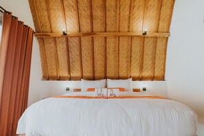 Premium bedding, pillow-top beds, minibar, in-room safe