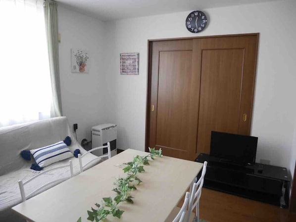 Basic Apartment | Living area | Flat-screen TV
