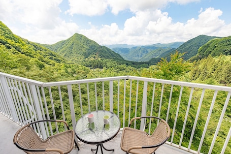 Private Vacation Home | Terrace/patio. A villa in the forest in Minamikaruizawa