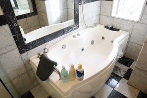 Apartment (2902) | Bathroom | Separate tub and shower, free toiletries, hair dryer, electronic bidet