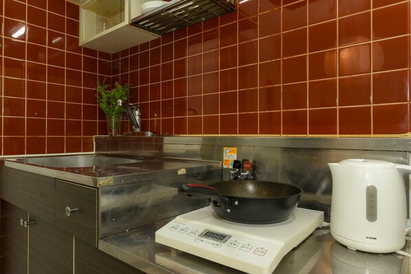 Apartment | Private kitchen | Fridge, microwave, electric kettle, griddle