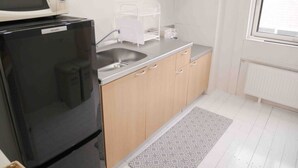 Casa (Private Vacation Home) | Cucina privata | Frigorifero, microonde, piano cottura, bollitore elettrico