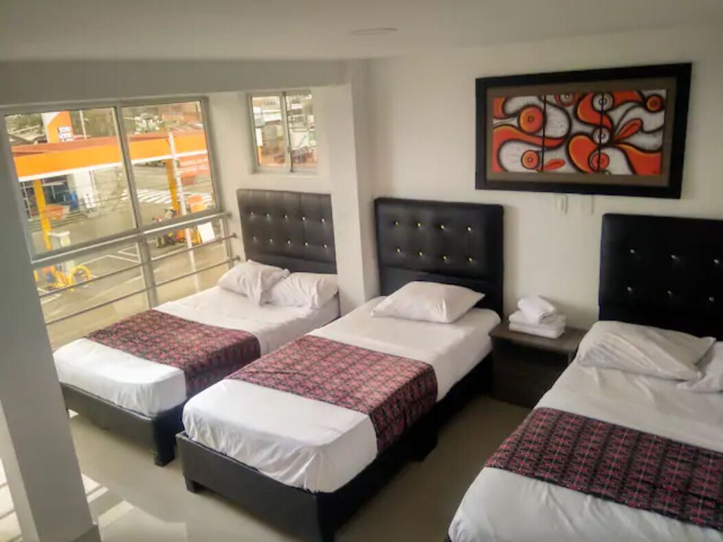 Habitación familiar | Ropa de cama hipoalergénica y wifi gratis 