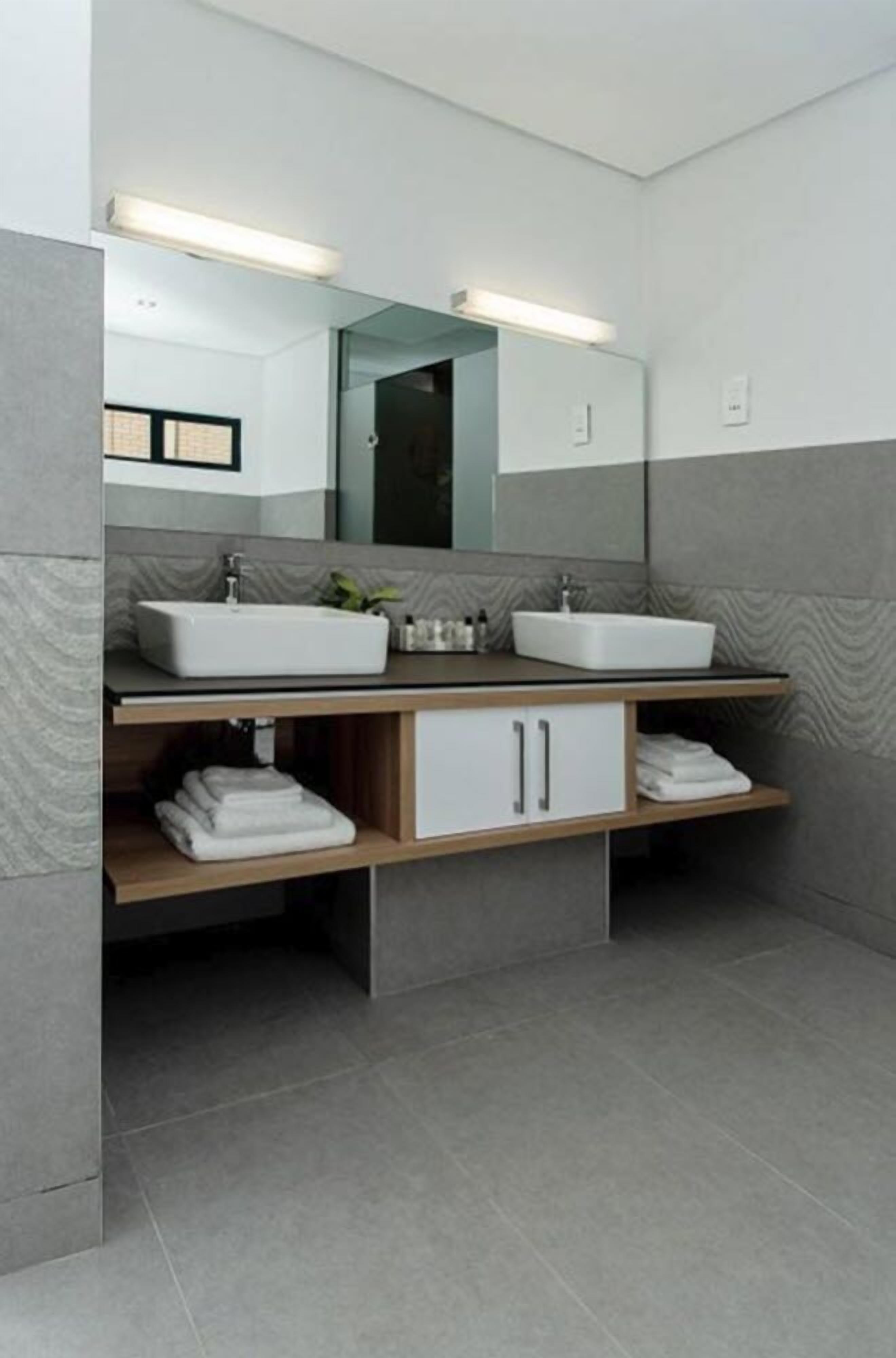 superior double room | bathroom | shower, slippers, towels, soap