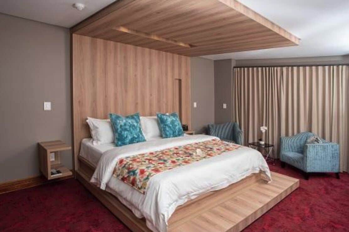 luxury double room | in-room safe, blackout curtains, soundproofing, iron/ironing board