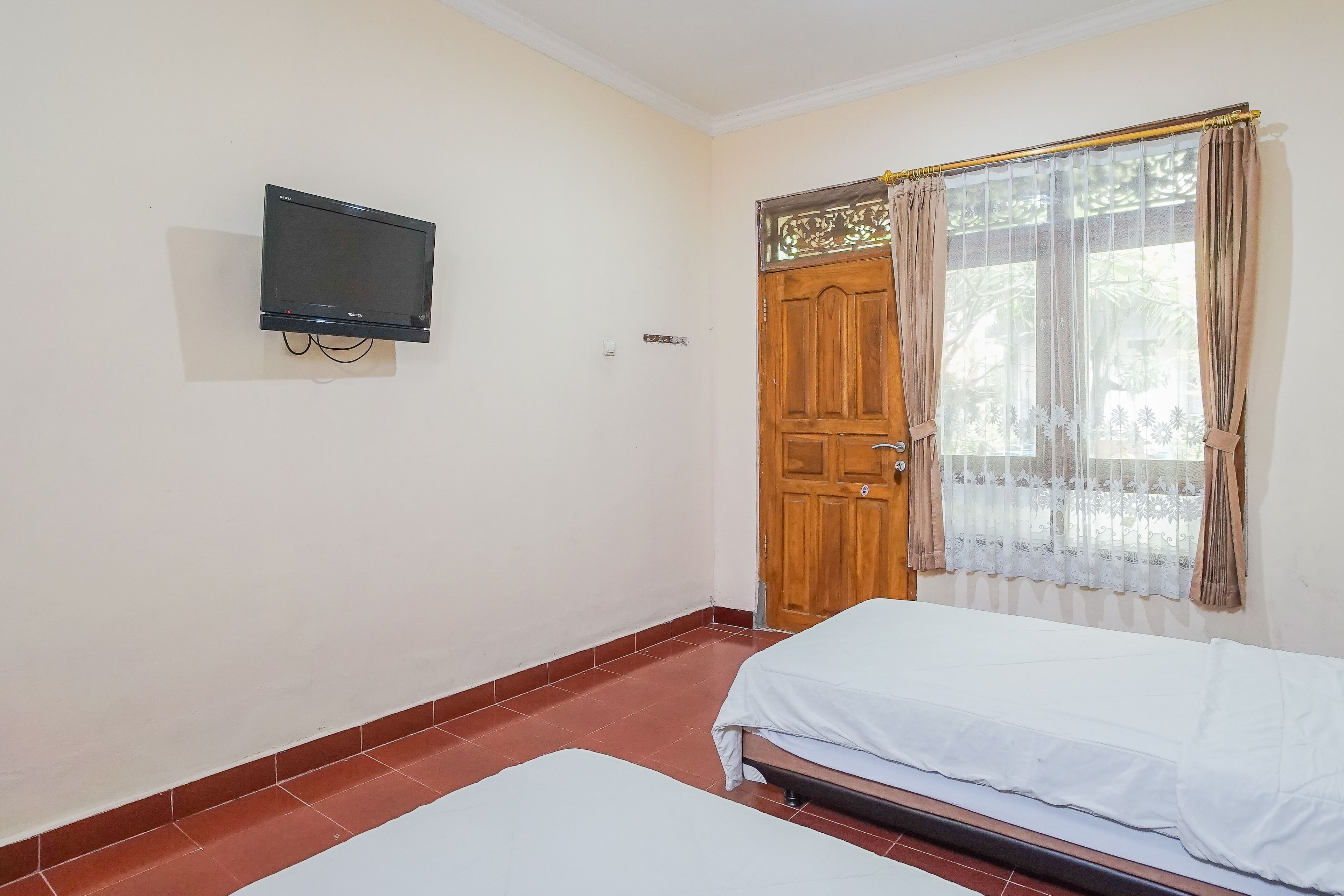 Photo - RedDoorz at Mahendra Beach Inn Kuta