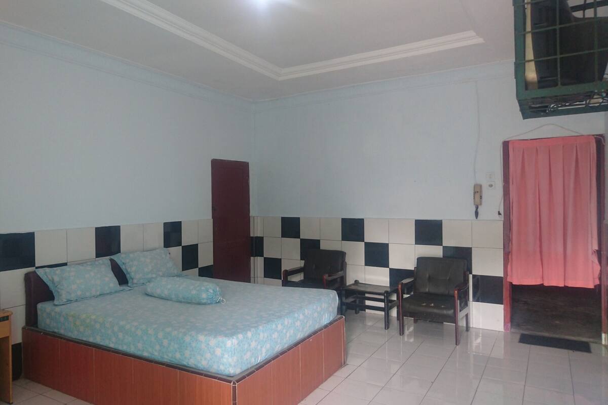 Habitación Deluxe | Escritorio, wifi gratis, ropa de cama