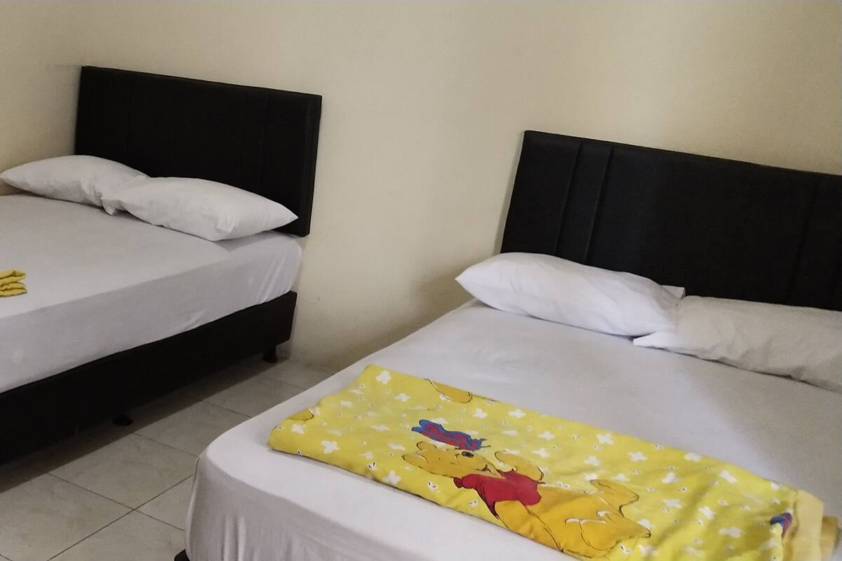 Standard Quadruple Room | Desk, individually furnished, bed sheets