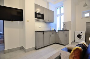 Apartamento | Área de estar | TV de tela plana