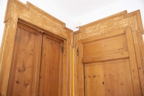 A wooden door with a simple, classic design.