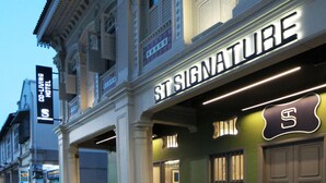 A hotel facade with ornate architectural details, a prominent 'ST SIGNATURE' sign, and a 'CO-LIVING HOTEL' sign. - ST Signature Jalan Besar, SHORT OVERNIGHT, 8 hours: 11:59PM-8AM (Singapore)