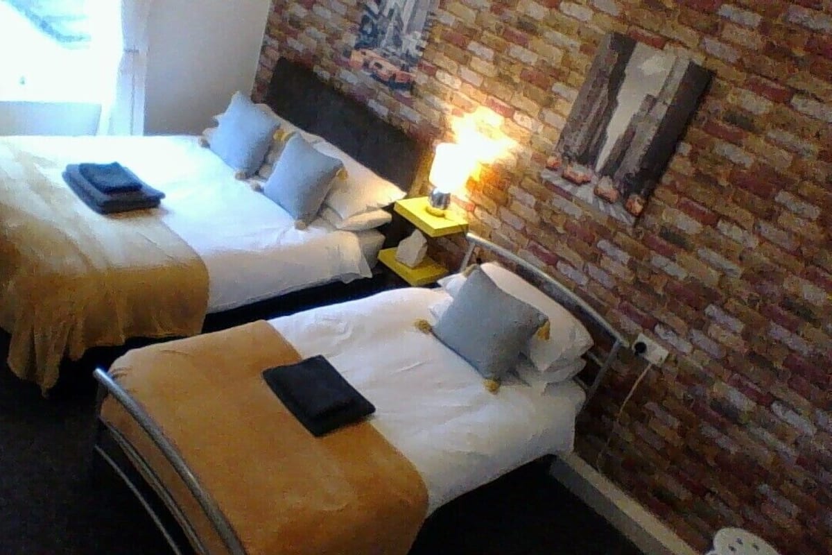 Triple Room | 2 bedrooms, individually decorated, iron/ironing board, free WiFi