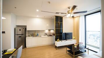 Apartamento conforto, 2 quartos | Área de estar