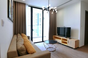 Business Apartment, 1 Bedroom | Living area | 52-inch Smart TV with cable channels, TV, fireplace - Homefromhome Skylake Apartment (Hanoi)