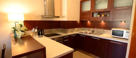 Apartment | Private kitchen | Fridge, microwave, oven, stovetop