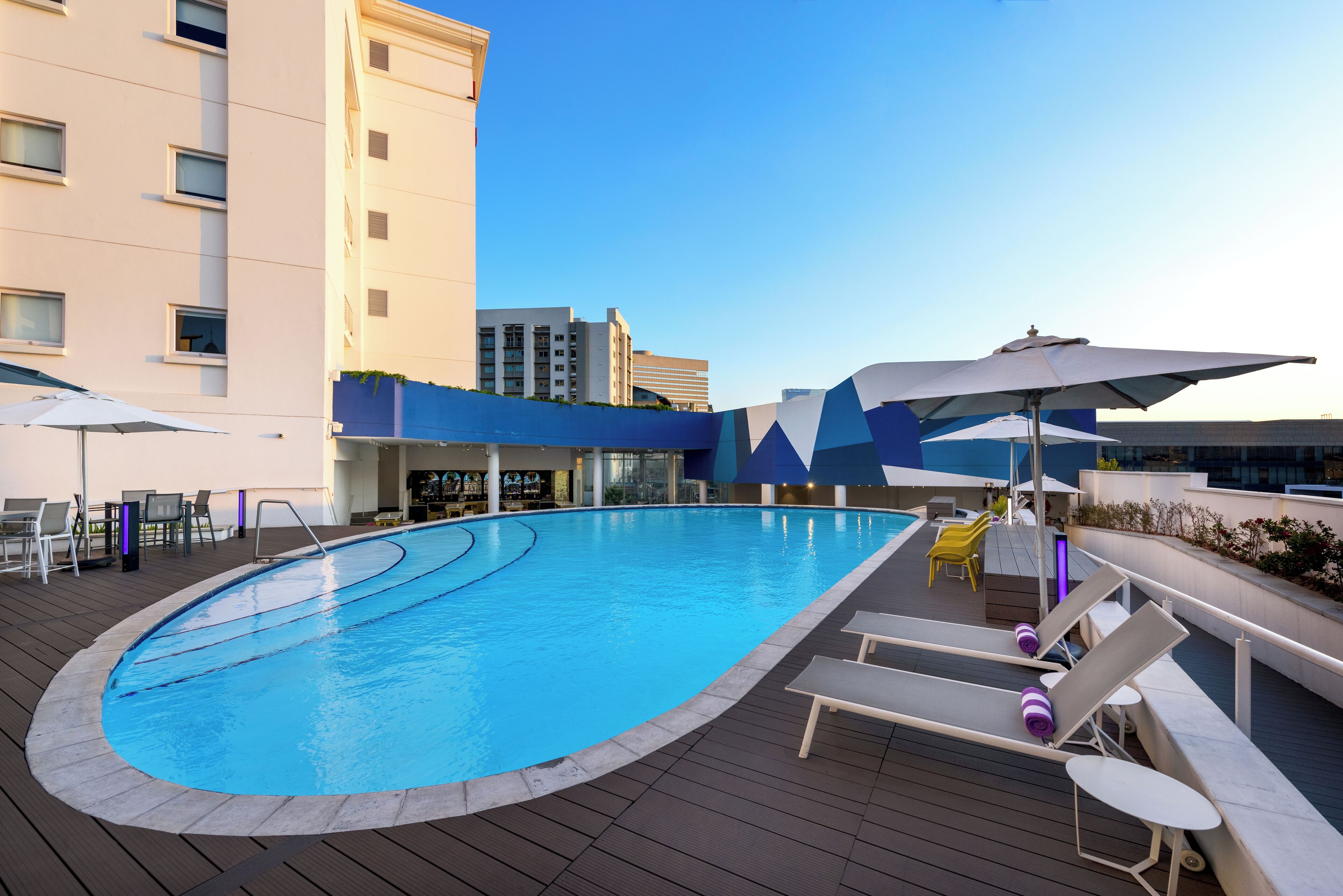 Outdoor pool, pool umbrellas, pool loungers