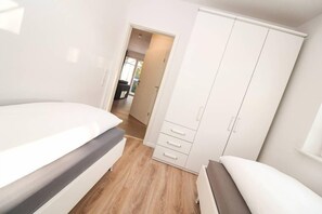 Apartamento, 2 quartos | 2 quartos, Wi-Fi de cortesia, roupa de cama