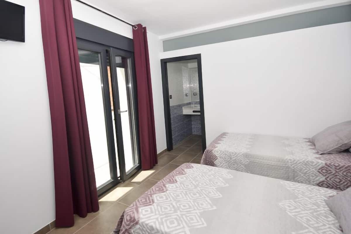 Kamar Twin | Wi-Fi gratis dan seprai linen