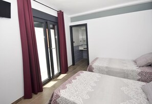 Habitación con 2 camas individuales | Wifi gratis y ropa de cama