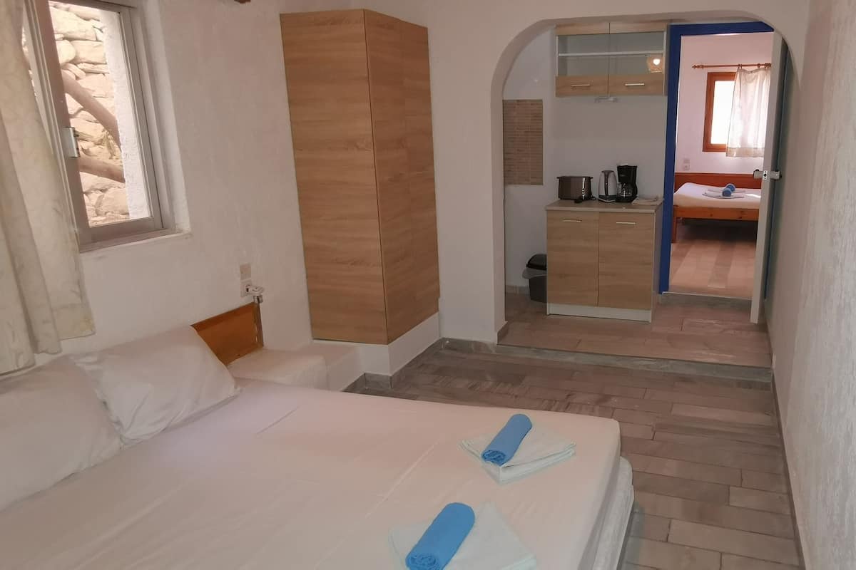 Family Apartment, 2 Bedrooms, Kitchenette, Garden View | Individually decorated, individually furnished, desk, laptop workspace