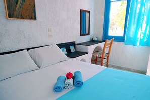 Family Apartment, 2 Bedrooms, Kitchenette, Garden View | Individually decorated, individually furnished, desk, laptop workspace - Oleander's Garden (Ierapetra)