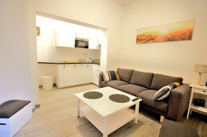 Apartamento | Zona de estar | Una televisión de pantalla plana