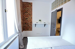 Apartamento | 3 dormitorios, tabla de planchar con plancha, wifi gratis y ropa de cama