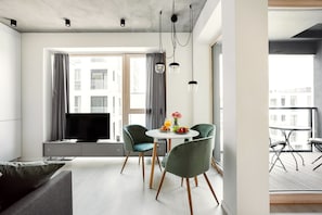 Departamento de diseñador | Sala de estar | Televisión de pantalla plana, Netflix y piso con calefacción 
