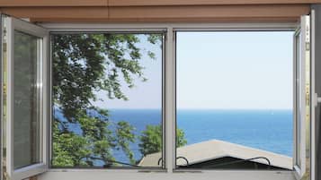 Comfort-Doppelzimmer | Wohnbereich | 32-Zoll-Flachbildfernseher mit Kabelempfang, Fernseher
