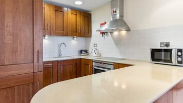 Apartment, 2 Bedrooms | Private kitchen | Full-sized fridge, microwave, oven, stovetop