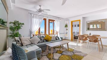 Apartment, 2 Bedrooms | Living area | Flat-screen TV