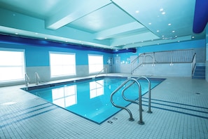 Indoor pool, open 7:00 AM to 11:00 PM, sun loungers