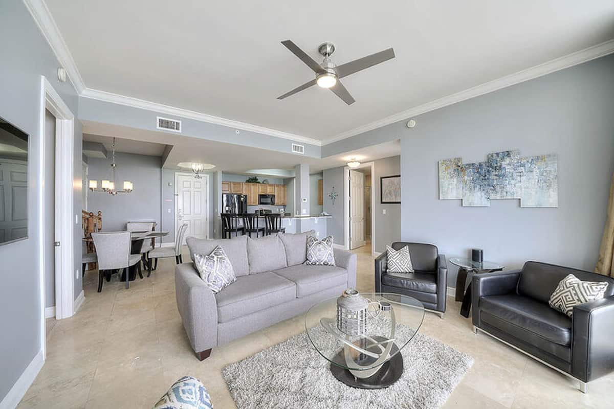 Condo, 4 Bedrooms | Living room | Flat-screen TV, DVD player