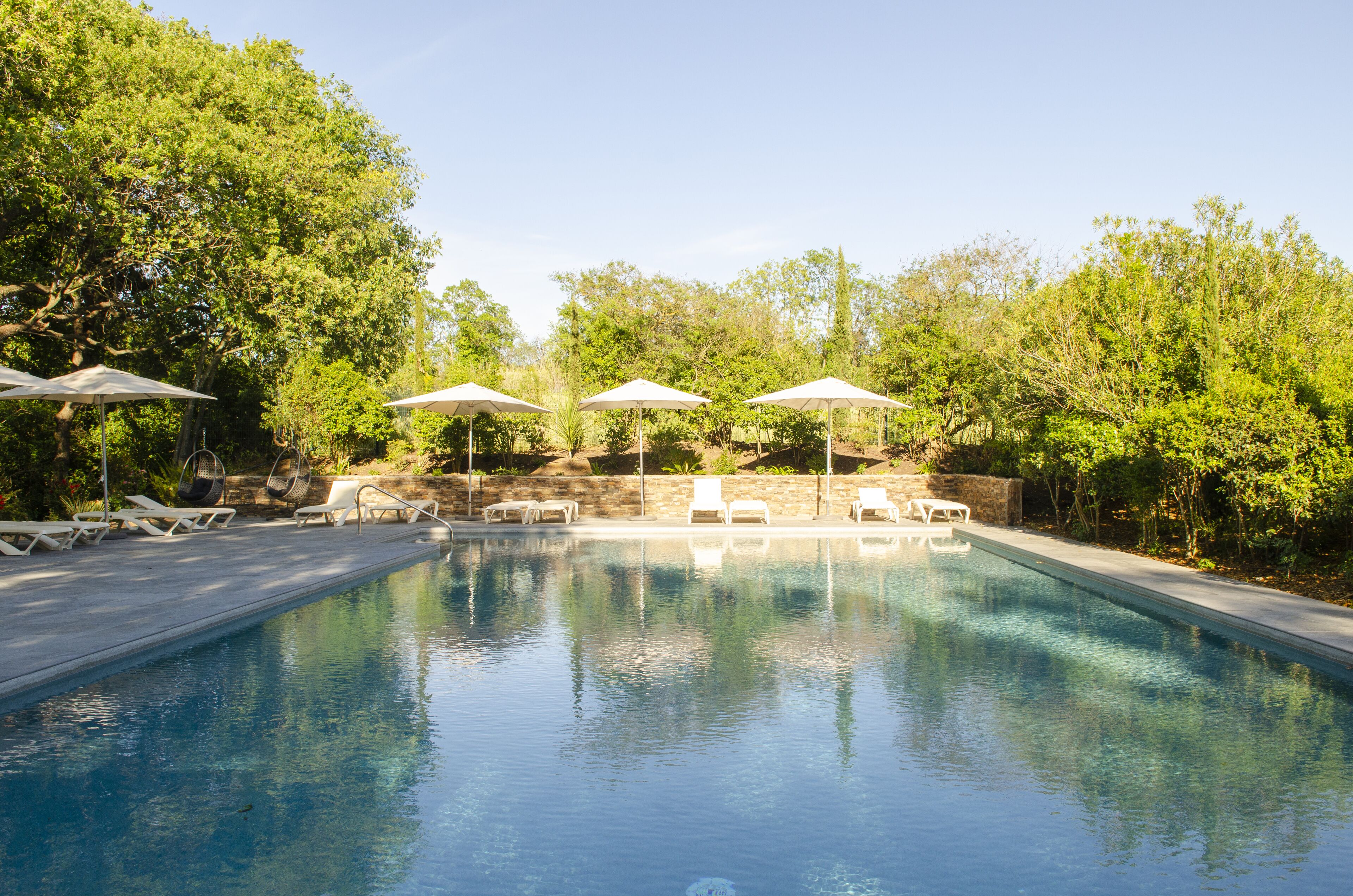 Outdoor pool, pool umbrellas, pool loungers