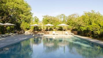 Outdoor pool, pool umbrellas, pool loungers