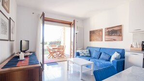 Apartment, 1 Bedroom | Living area | Flat-screen TV - Casa Davide (Riva del Garda)