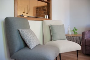 Apartment, 1 Bedroom | Living area | Flat-screen TV