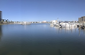 Stunning marina views with boats docked at the piers.