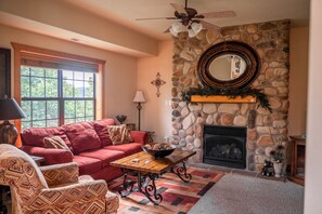 Family Cabin, 2 Bedrooms, Jetted Tub | Living area - Cabins at Grand Mountain (Branson)