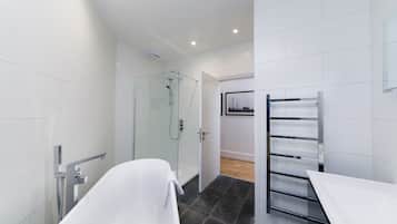 Apartment, 1 Bedroom | Bathroom | Shower, free toiletries, hair dryer, towels