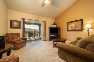 Family Condo, 2 Bedrooms, Terrace, Golf View | Living area | 40-inch flat-screen TV with cable channels, TV, DVD player