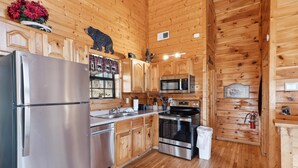 Unclassified image, 3 of 35, button - A Tranquility Den #210 (Pigeon Forge)